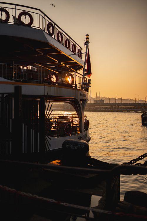 Free Ferry silhouetted at sunset on the Bosphorus in Istanbul, Turkey. Stock Photo
