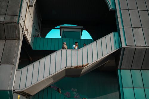 Free City staircase scene in Istanbul with modern architecture and people on a sunny day. Stock Photo