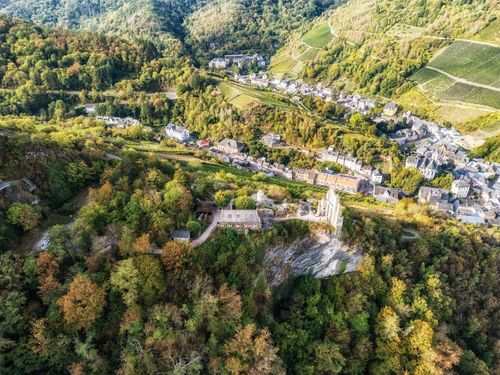 Free Aerial view of Beilstein town and ruins surrounded by lush autumn foliage. Stock Photo