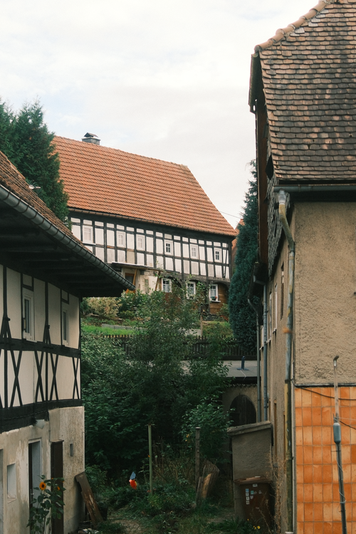 Free A scenic view of historic half-timbered houses in Dittersdorf, Germany. Stock Photo