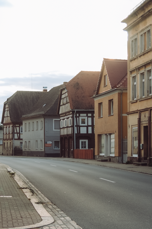 Free Traditional German street scene with half-timbered houses in Dittersdorf, Thüringen. Stock Photo