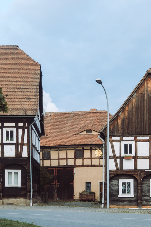 Free Charming half-timbered houses in Dittersdorf, Germany, showcasing traditional architecture. Stock Photo