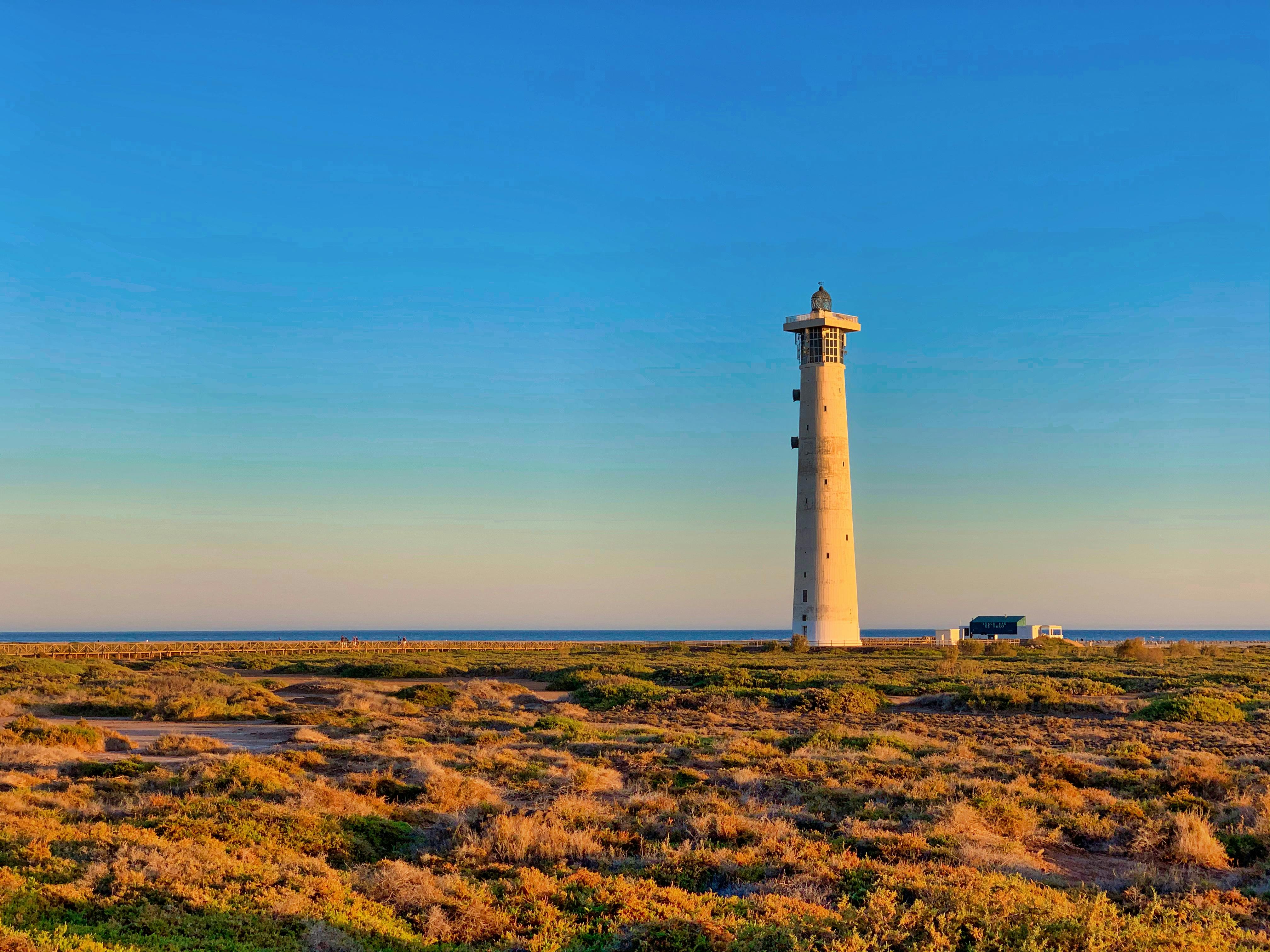 White Lighthouse Under Blue Sky \u00b7 Free Stock Photo