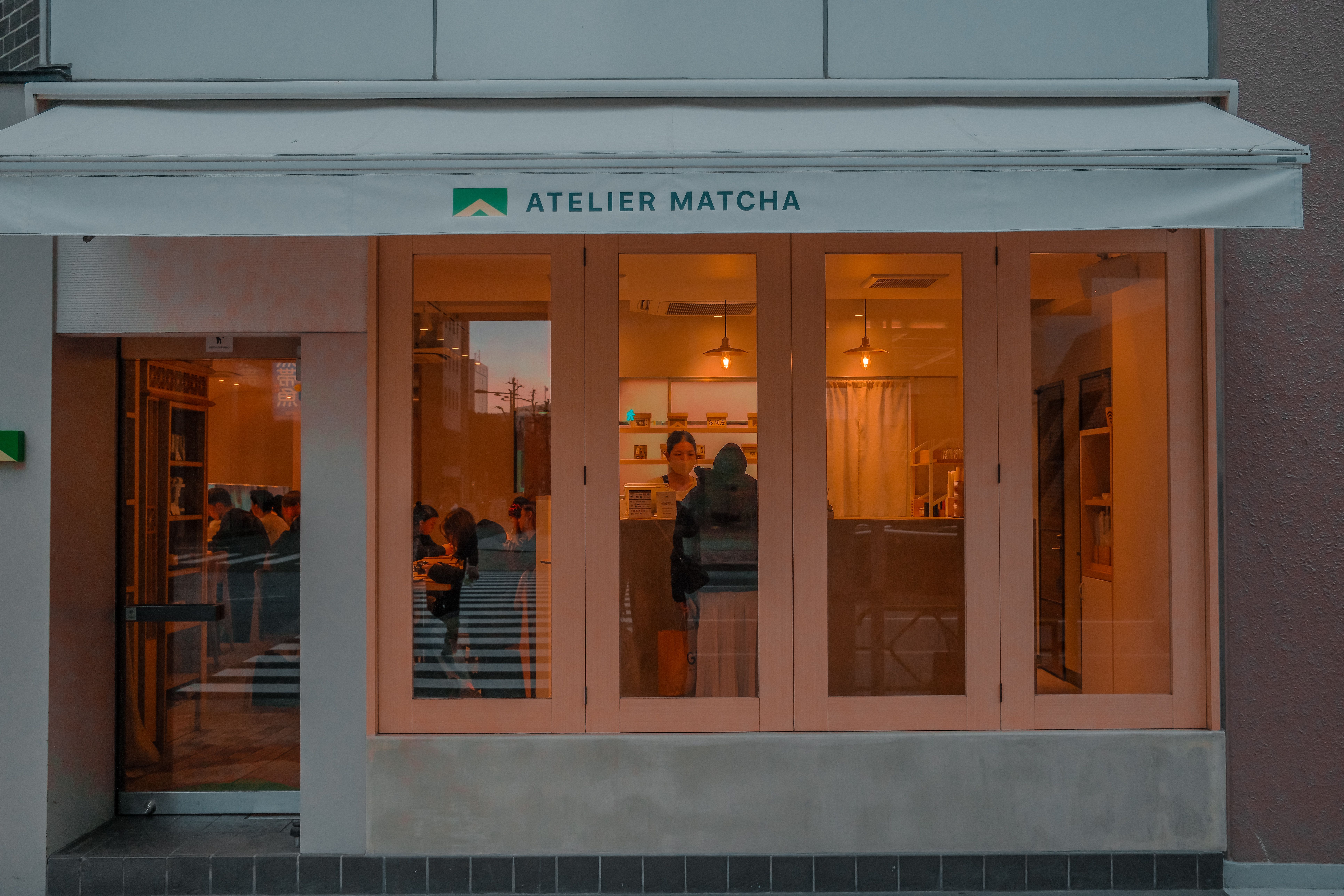 Neighborhood shopfront with morning light