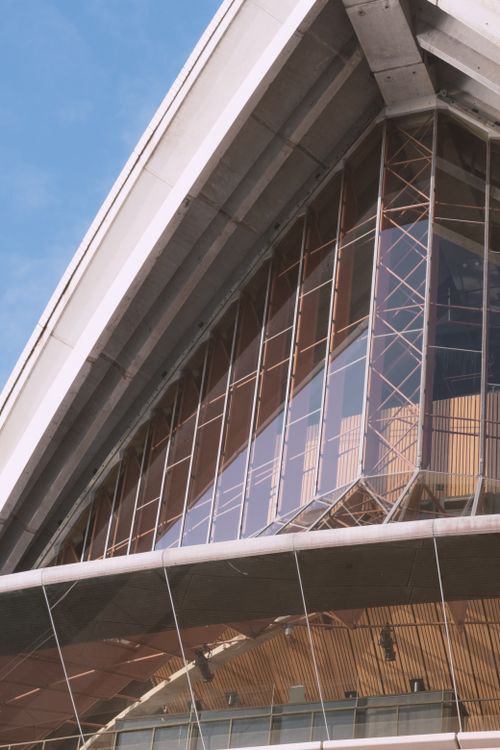 Free Detailed view of the iconic Sydney Opera House concentrating on its modern glass facade. Stock Photo