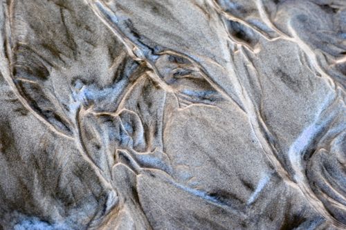 Free Close-up of natural sand patterns creating an abstract design in Paraná, Brazil. Stock Photo