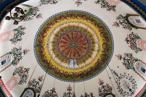 Free A detailed view of a beautifully ornate dome ceiling with floral designs in a mosque in Pristina. Stock Photo