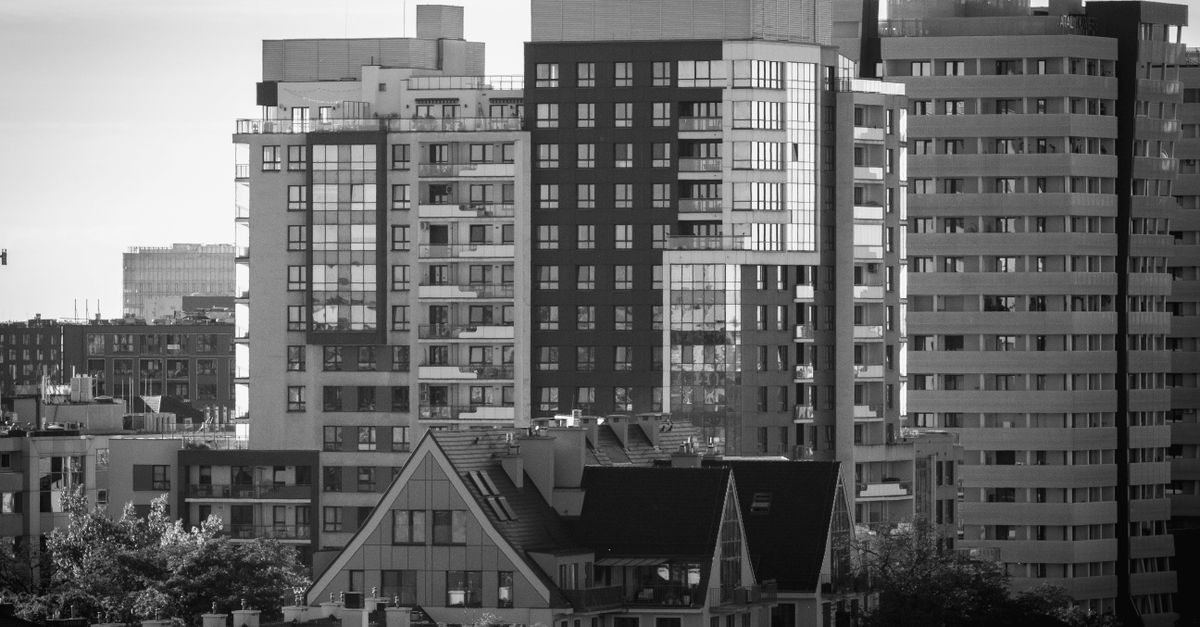 Black and white view of the urban skyline featuring contemporary architecture in Wrocław, Poland.