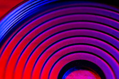Free Colorful abstract image of concentric circles with striking red and blue lighting effects. Stock Photo