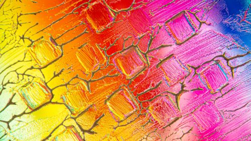 Free Colorful abstract art featuring a vivid crystalline pattern in a spectrum of bright hues. Stock Photo