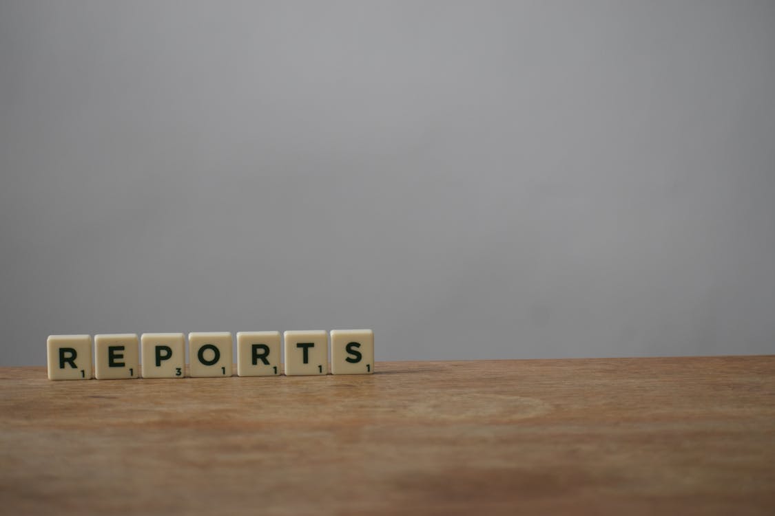 Scrabble Letters on Wooden Desk