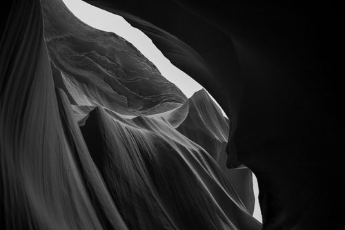 Free Explore the dramatic beauty of canyon formations in this black and white abstract landscape. Stock Photo