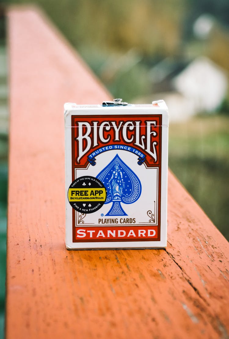 Cardboard Box Of Cards With BICYCLE And STANDARD Inscriptions Outdoors