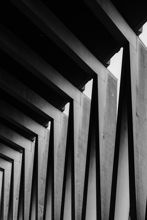 Free Abstract view of a modern architectural structure in Amsterdam, showcasing bold lines and shadows. Stock Photo