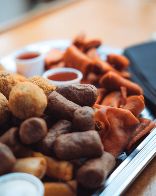 Free A variety of traditional Dutch snacks served in an Amsterdam cafe setting. Stock Photo