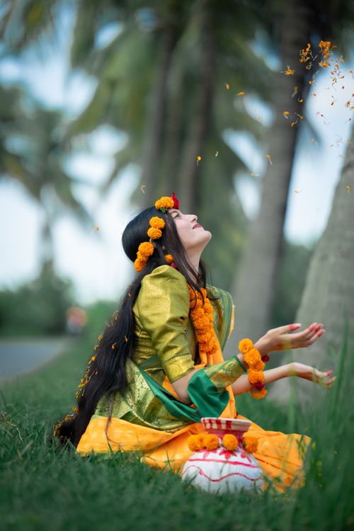 Free Captivating portrait of a South Asian woman in ethnic attire enjoying nature. Stock Photo