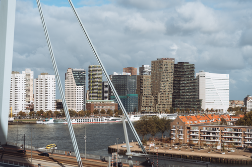 Free Captivating view of Rotterdam's modern skyline and waterfront architecture. Stock Photo