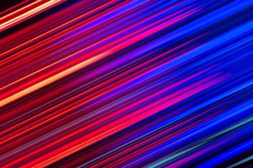 Free Dynamic abstract image featuring vibrant neon light trails in a futuristic design. Stock Photo