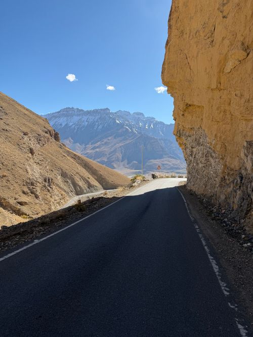 Free Dramatic view of a mountain road in Marango Rangarik with stunning landscapes and clear blue skies. Stock Photo
