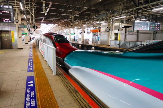 Shinkansen trains coupled at Sendai Station in Miyagi, Japan. High-speed rail transportation.