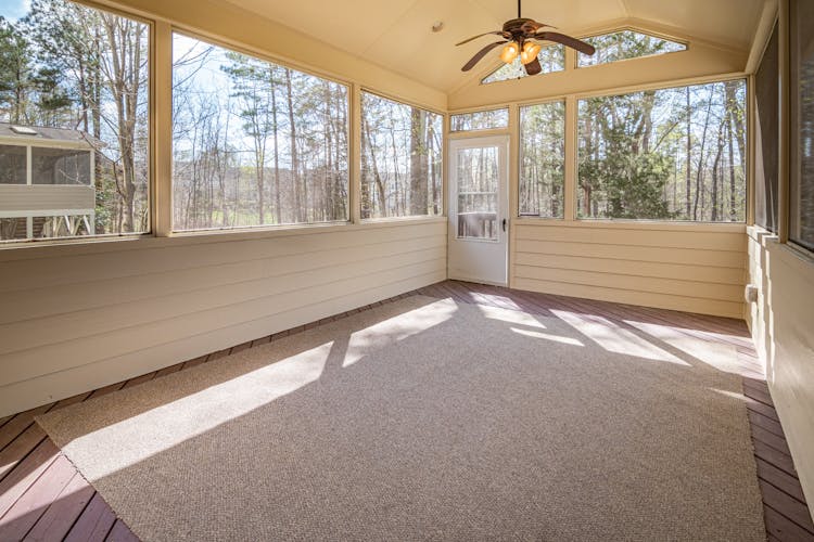 Carpet On Wooden Flooring