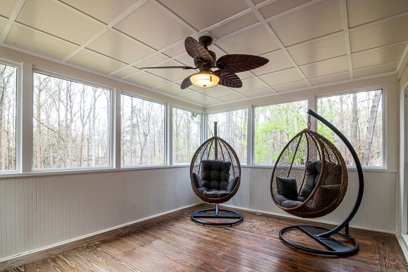 Ceiling fan in a bright sunroom