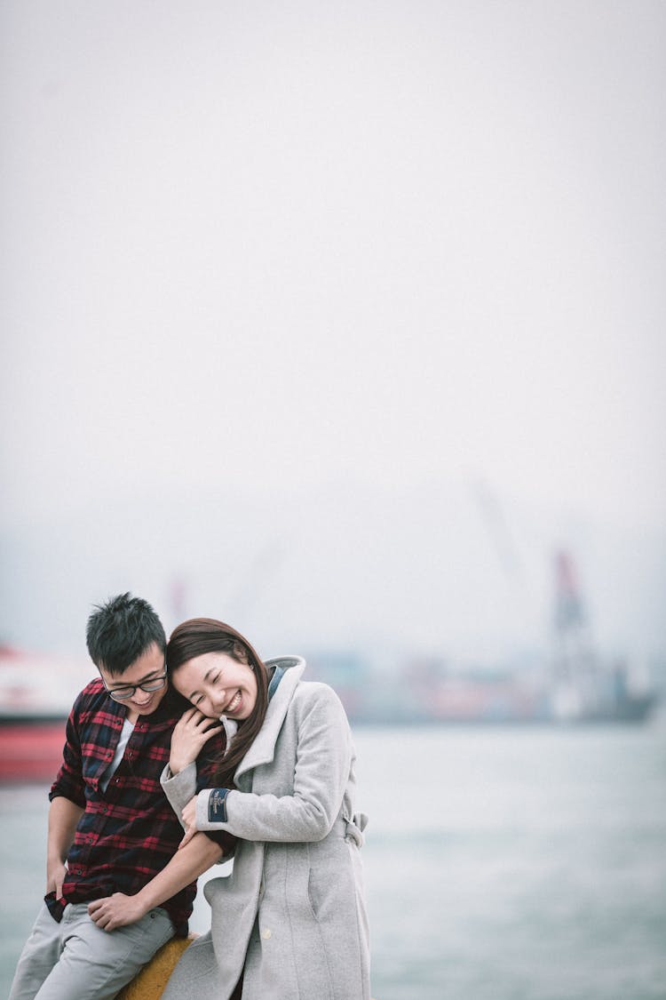 Joyful Asian Couple Bonding On Street