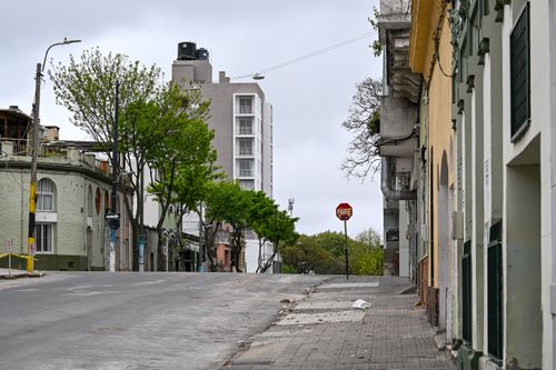 Free An empty street view showcasing architecture and urban life in Montevideo, Uruguay. Stock Photo