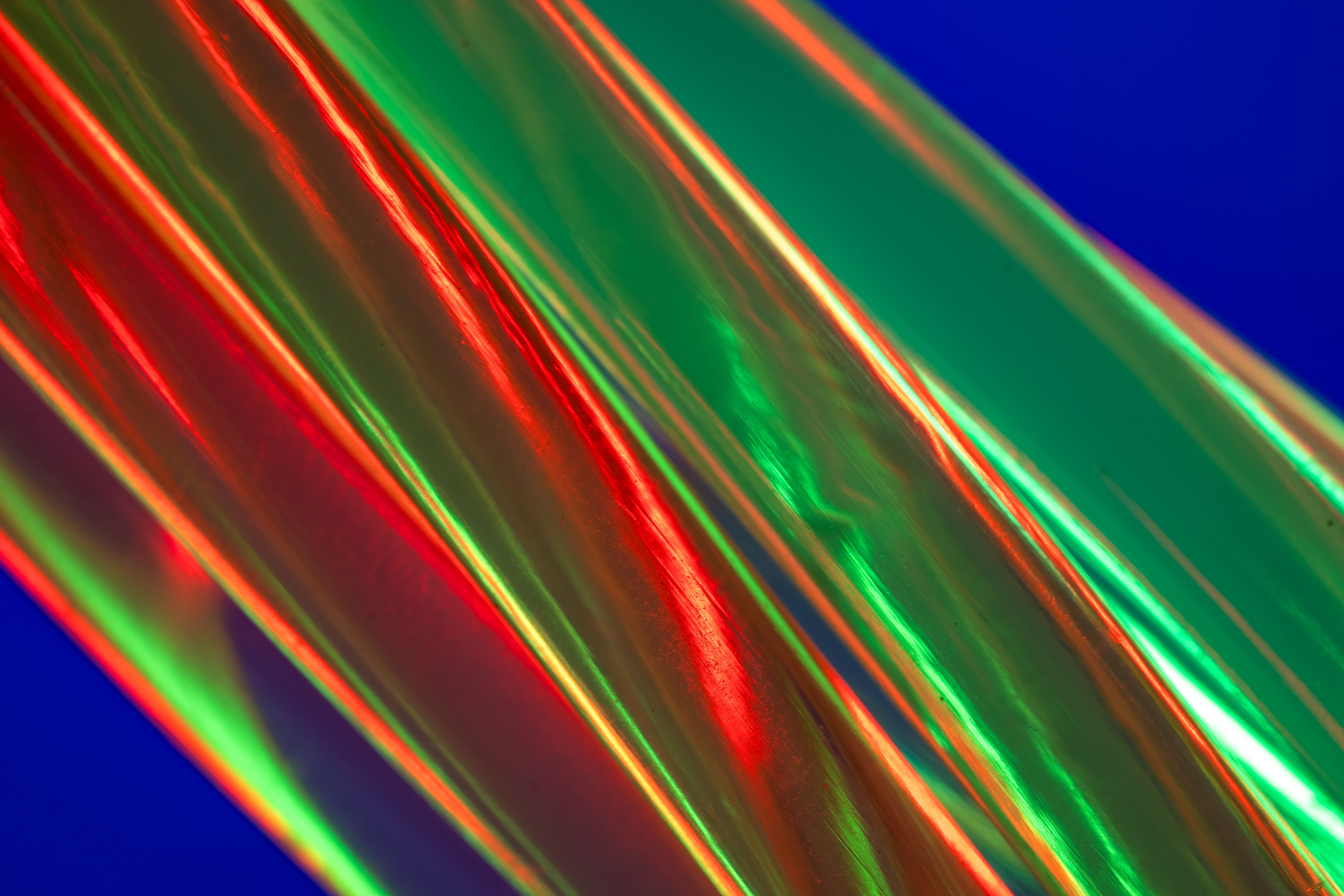 a transparent microfluidic chip with red and blue liquid channels