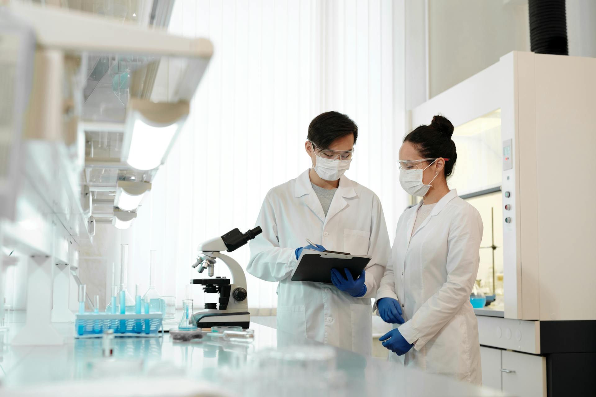 Two Scientists Working Inside the Laboratory