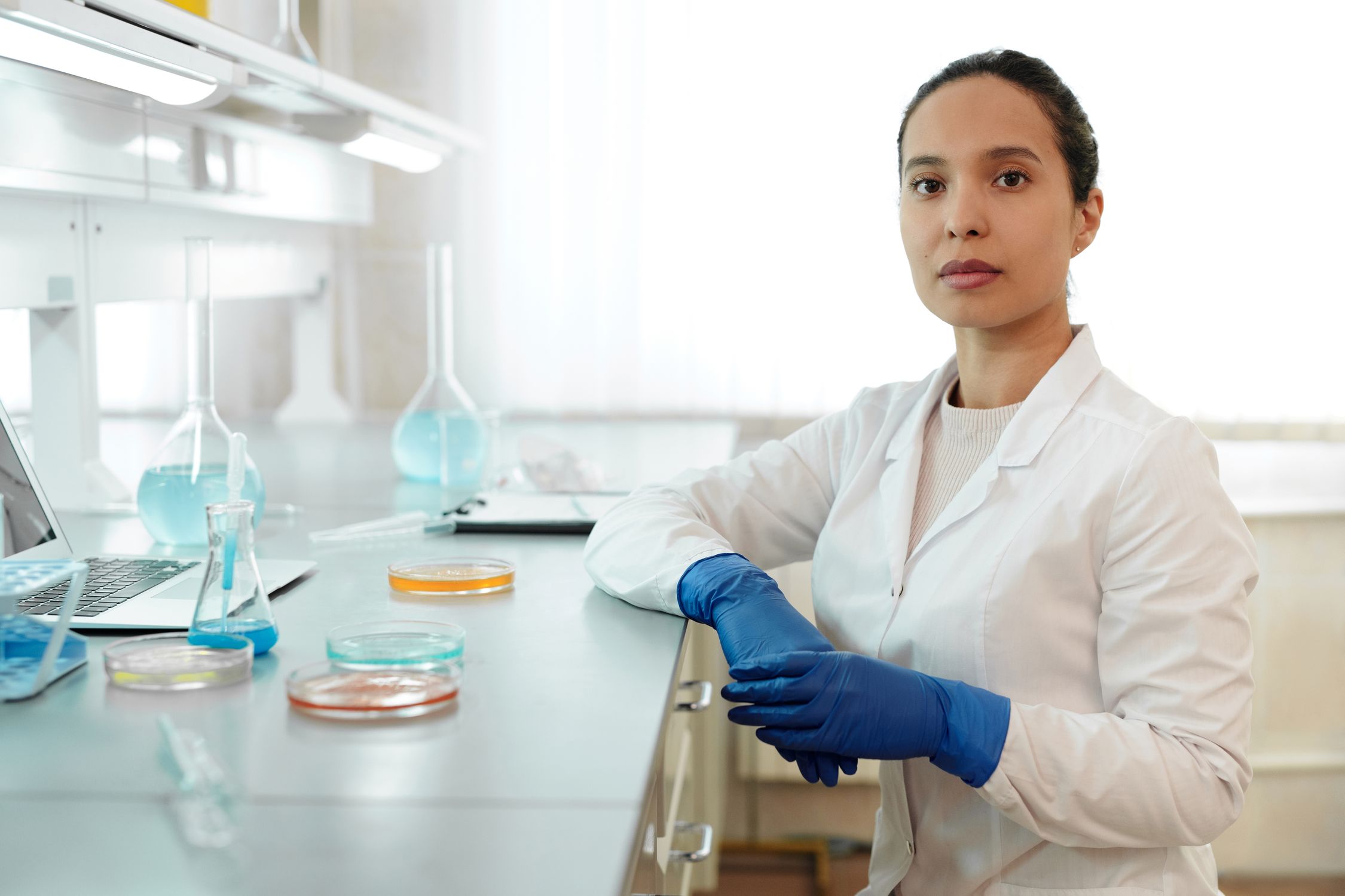 Female Scientist in White Lab Coat Working in a Laboratory · Free Stock ...