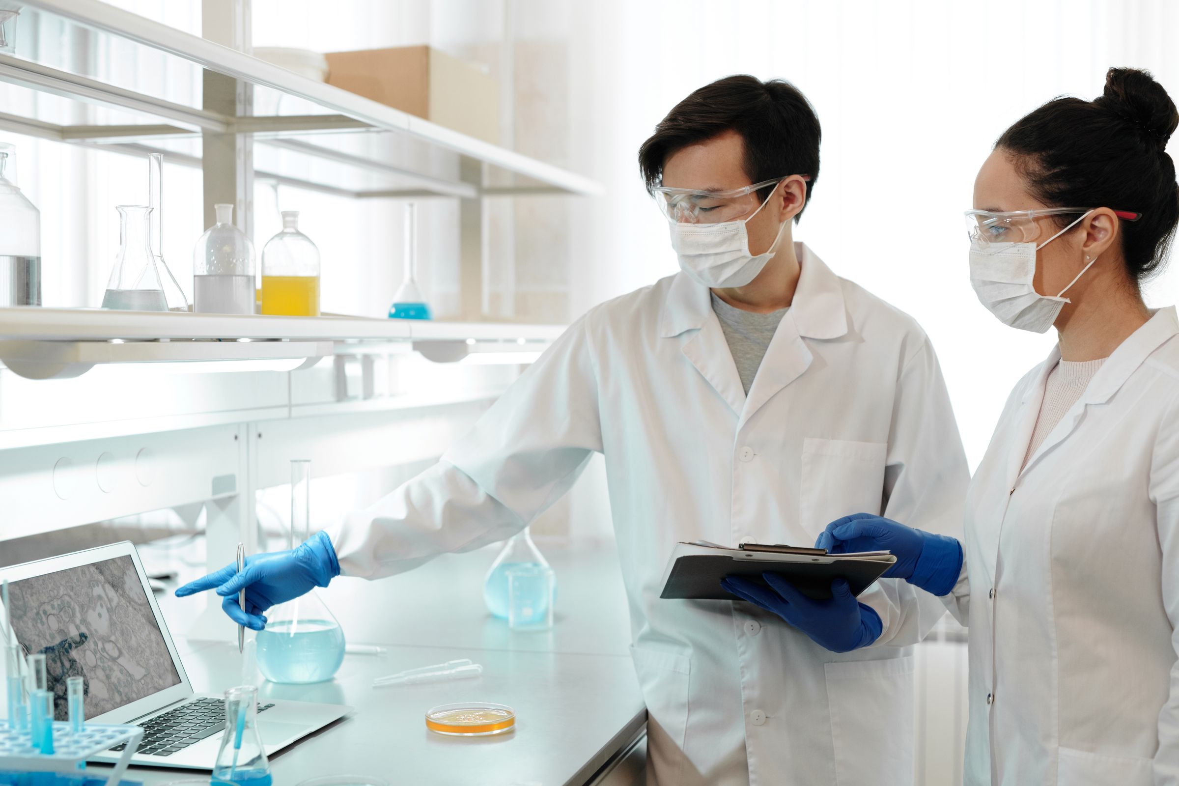 Researchers examining evidence and data in a laboratory