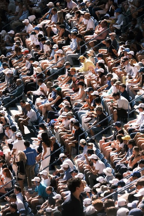 Free High-angle view of a diverse crowd enjoying an outdoor event on a sunny day. Stock Photo