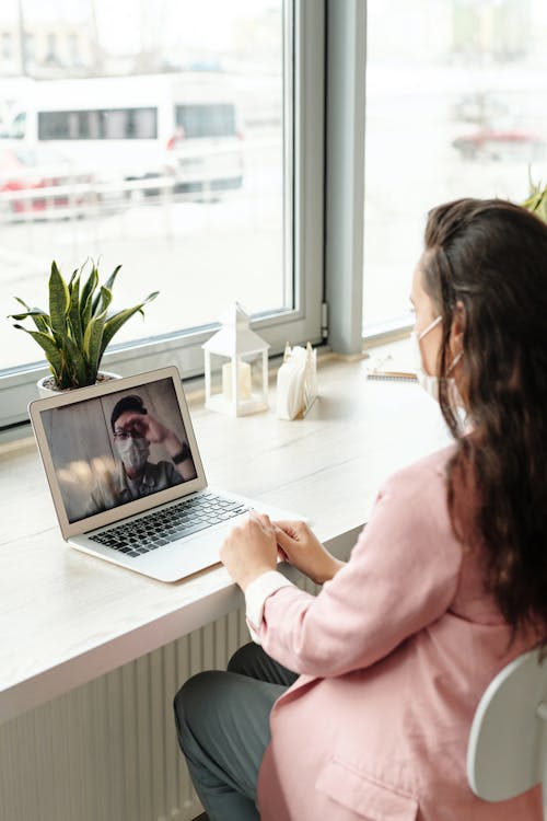 Woman Using Her Laptop On Video Call