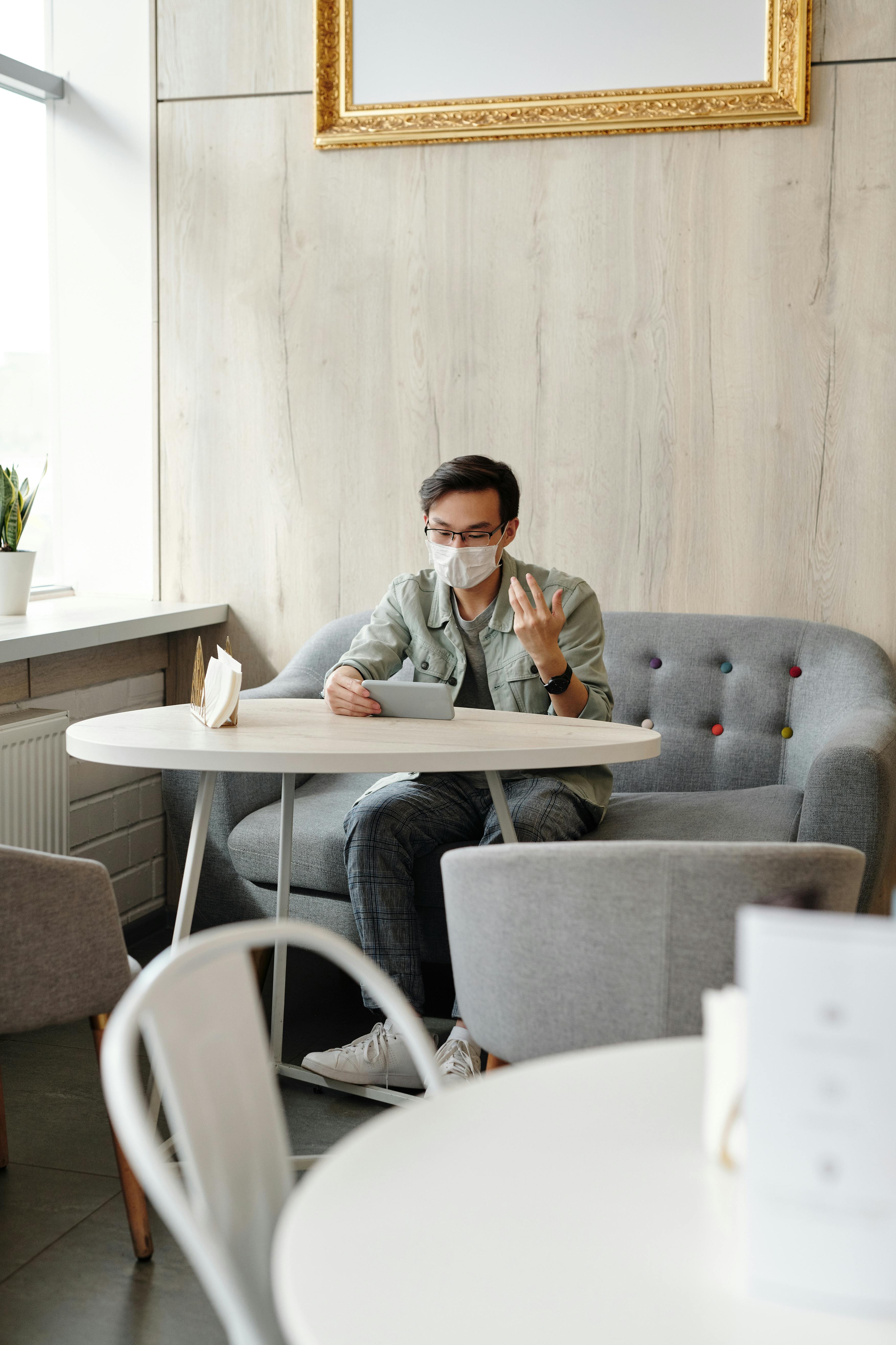 Man Having A Video Chat While In Isolation · Free Stock Photo
