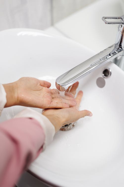 Free Woman Washing Her Hands Stock Photo