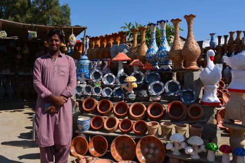 Free Vibrant pottery collection at a roadside market in Taxila, Punjab, Pakistan. Stock Photo