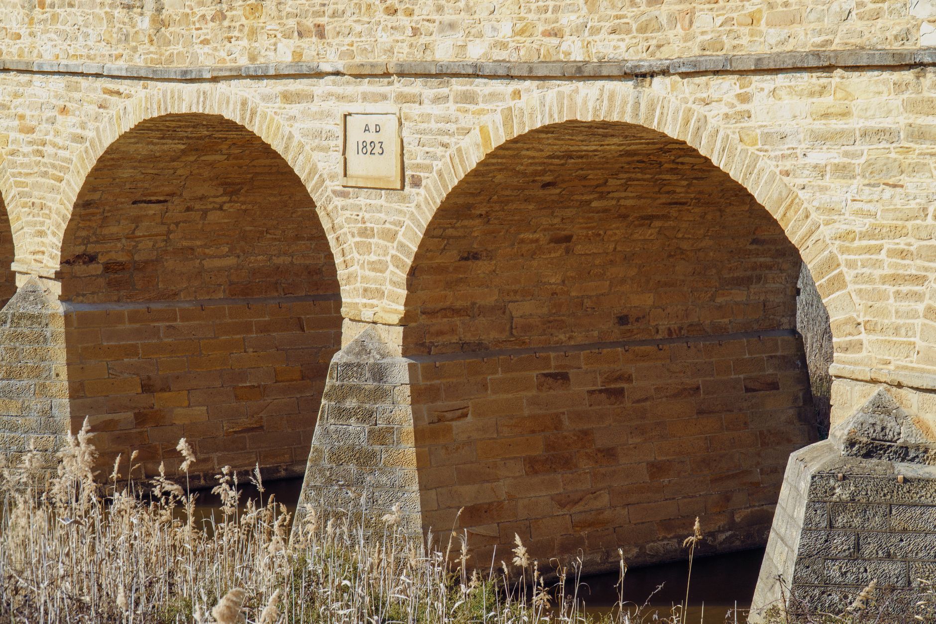Close-up view of Richmond Bridge, Australia's oldest stone arch bridge, built in 1823.