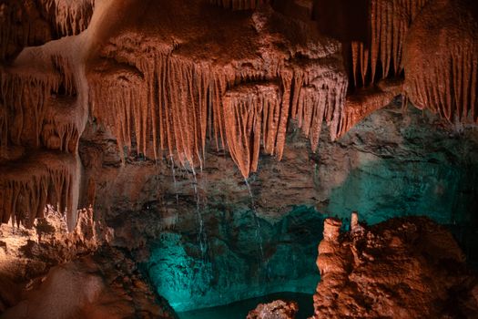 Explore the awe-inspiring stalactites of Mira de Aire caves in Portugal. A must-see natural wonder.
