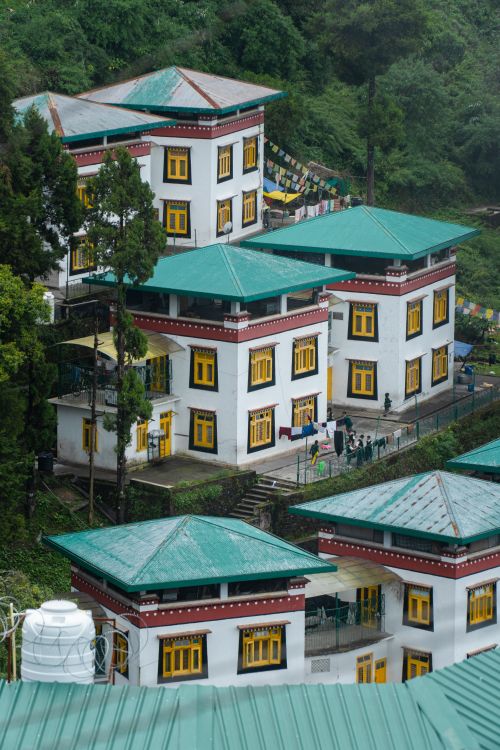 Free Stunning view of traditional buildings amidst forested hills in Mussoorie, India. Stock Photo