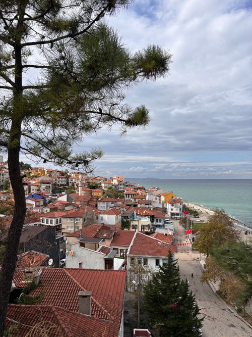 Free Aerial view of a charming coastal town in Bursa, Türkiye with houses and the sea. Stock Photo