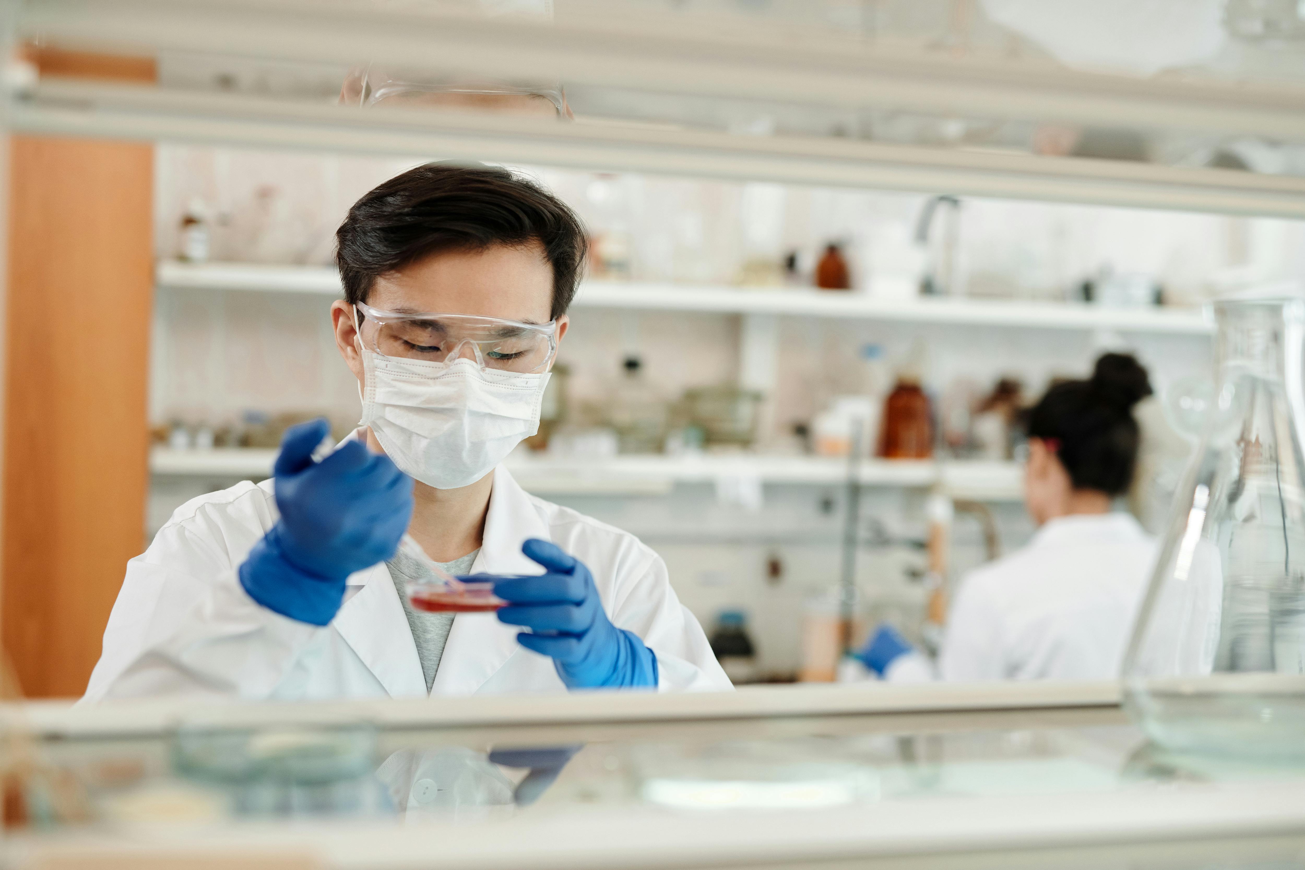 man doing a sample test in the laboratory