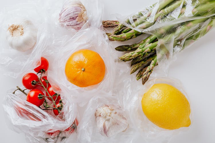 Fresh Fruits And Vegetables Put In Plastic Bags