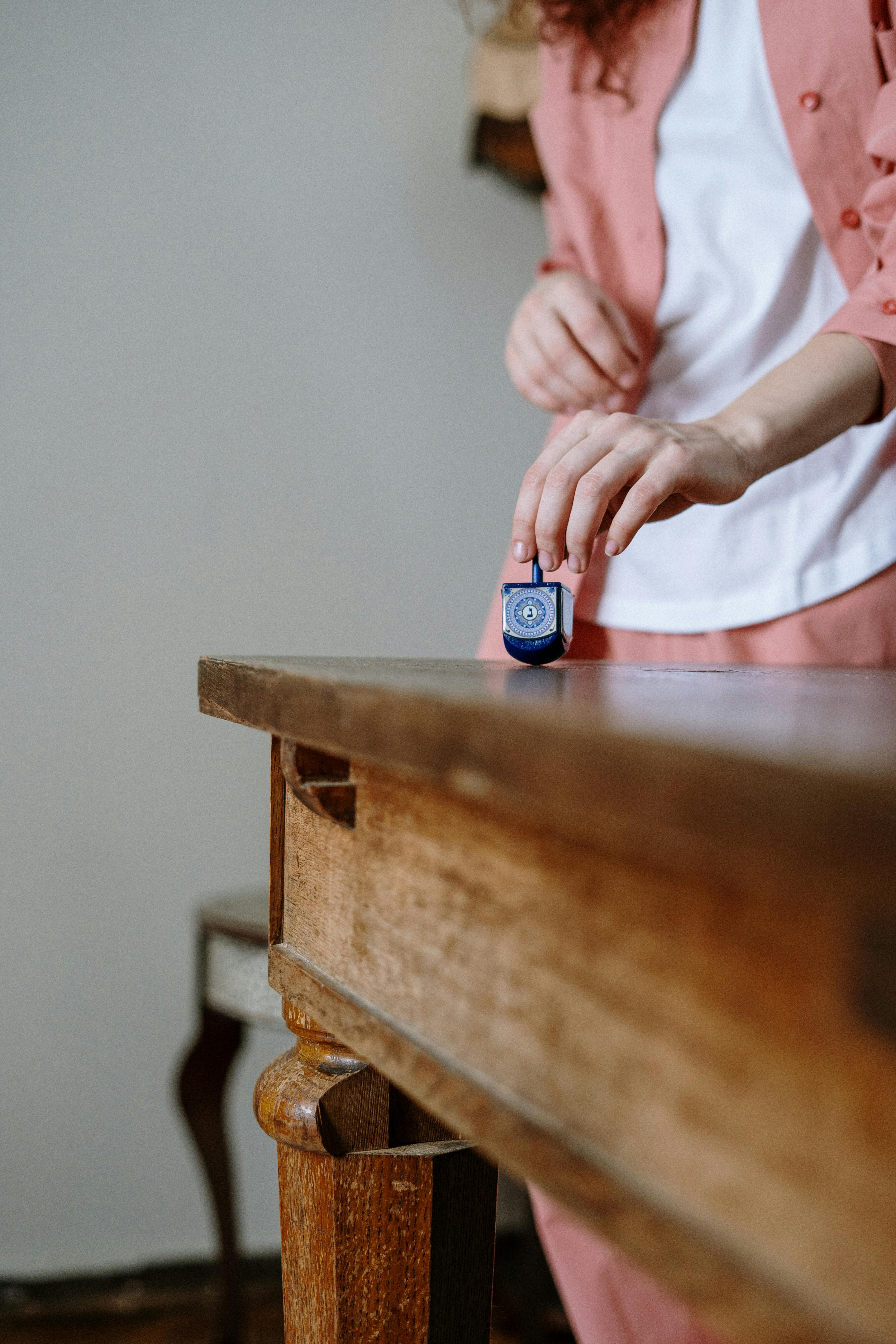 Person Holding a Dreidel \u00b7 Free Stock Photo