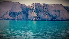 Mountain Peak Near Body of Water