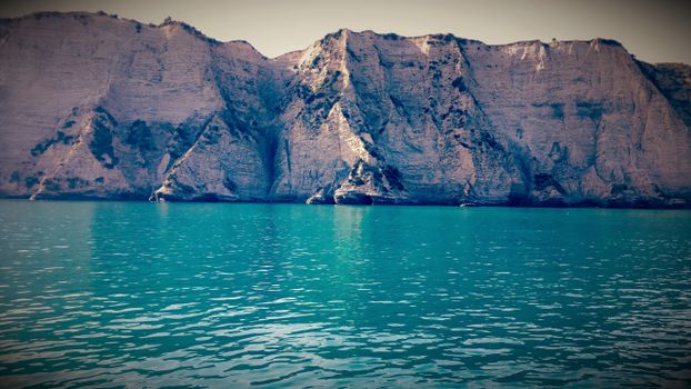 Mountain Peak Near Body of Water