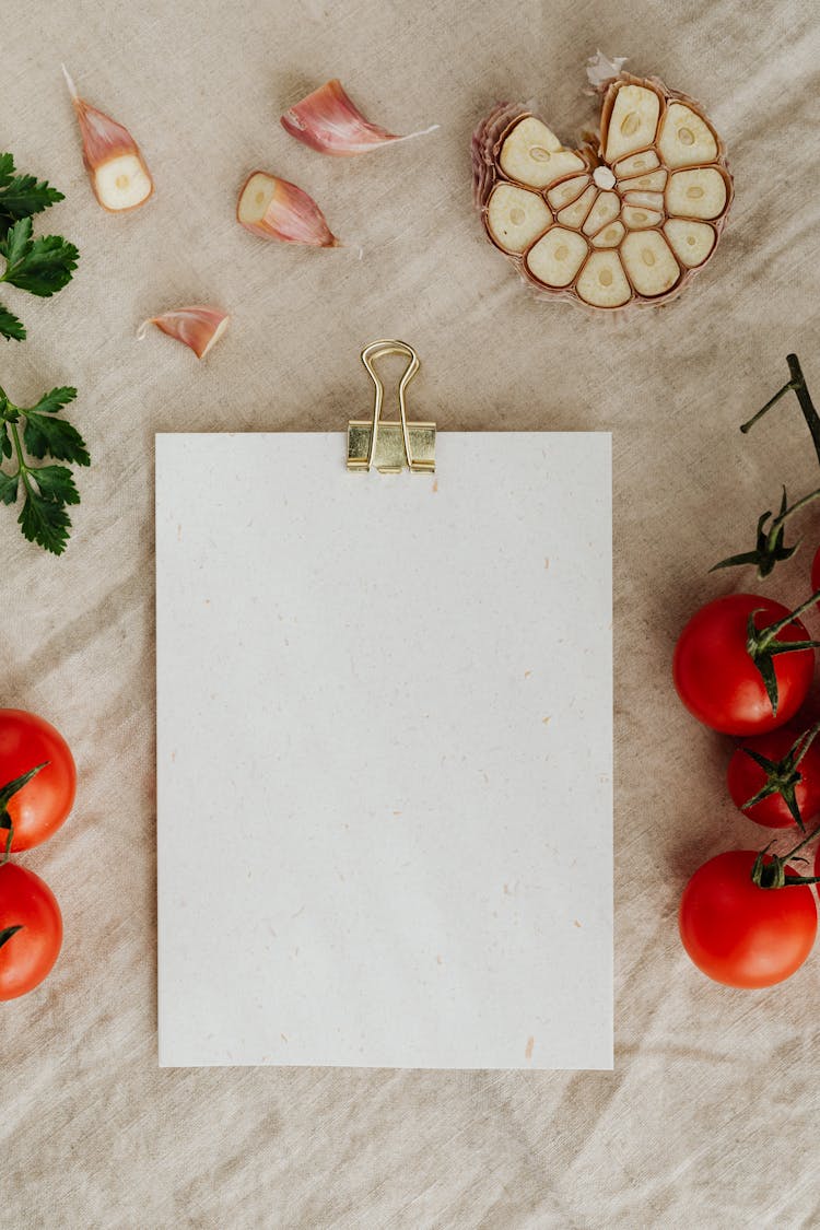 Blank Clipboard With Fresh Vegetables And Herbs On Table