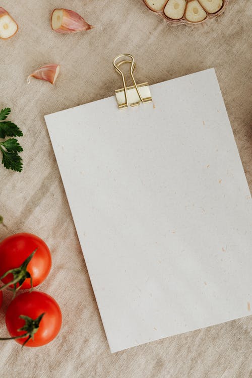 Fresh vegetables and herbs for recipe on table