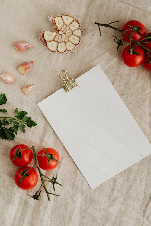 Free Set of tasty fresh vegetables and herbs with empty clipboard Stock Photo