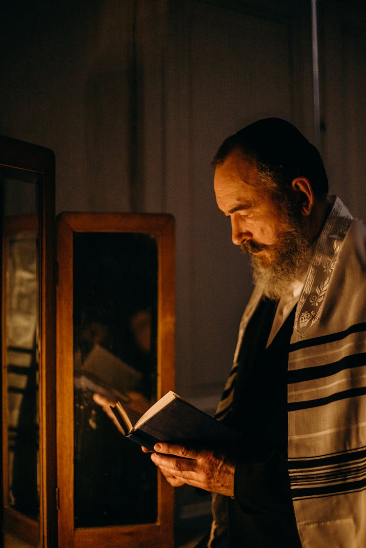 Bearded Man Reading A Book